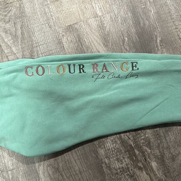 There a turquoise color, size medium, sweatpants - Picture 2 of 4